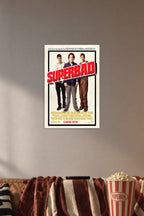 Superbad Movies in a cozy movie room above a brown sofa with popcorn.
