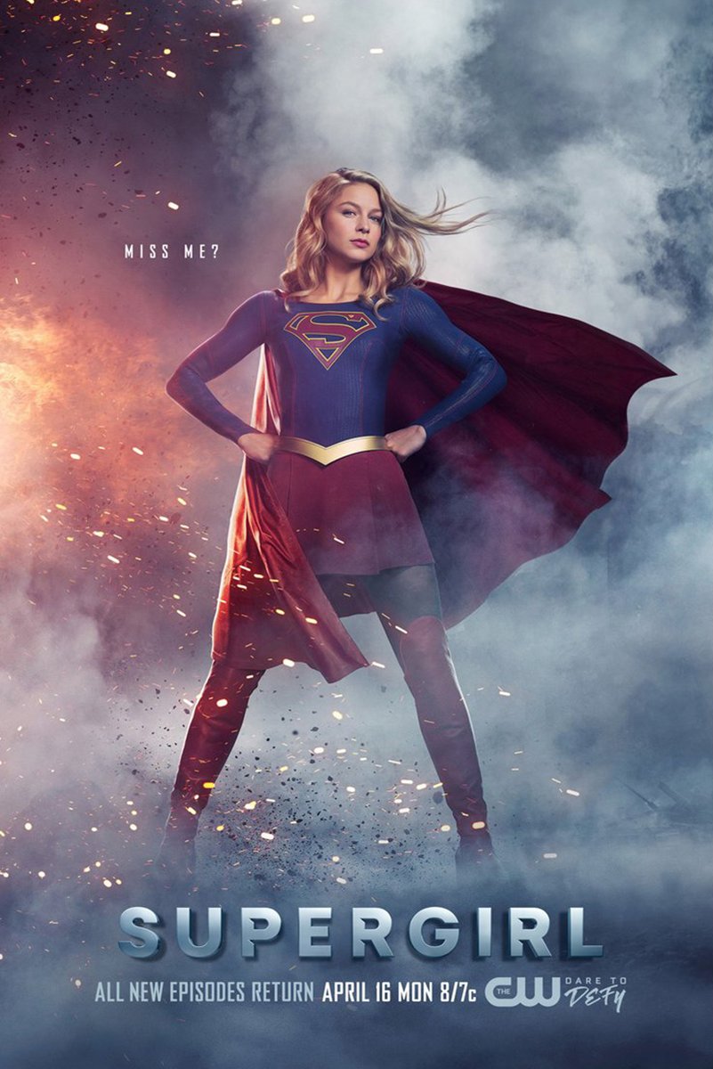 Supergirl poster features the heroine in a blue suit and red cape amid smoke, sparks, and the text “MISS ME?.