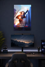 Supergirl in a gaming desk setup above a monitor.