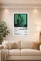 TV Girl Poster Grapes Upon The Vine Album Cover Posters in a bright living room above a beige sofa.