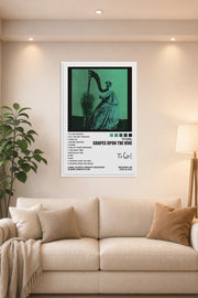 TV Girl Poster Grapes Upon The Vine Album Cover Posters in a bright living room above a beige sofa.