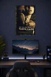Taking Lives Movie in a gaming desk setup above a monitor.