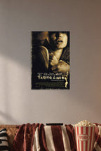 Taking Lives Movie in a cozy movie room above a brown sofa with popcorn.