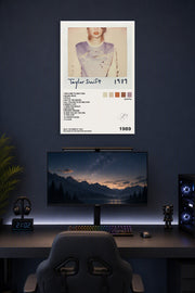 Taylor Swift 1989 Album in a gaming desk setup above a monitor.