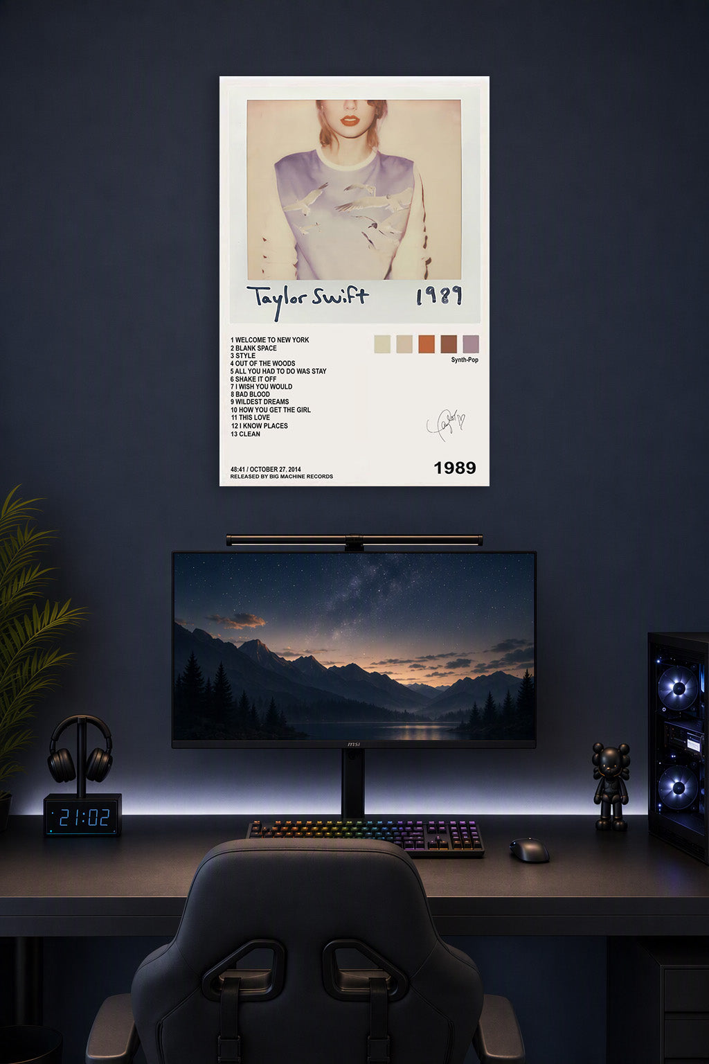 Taylor Swift 1989 Album in a gaming desk setup above a monitor.
