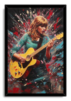 Taylor Swift framed wall art print depicts a blonde woman strumming a yellow guitar surrounded by vibrant teal, red, and pink splatter art.