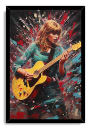 Taylor Swift framed wall art print depicts a blonde woman strumming a yellow guitar surrounded by vibrant teal, red, and pink splatter art.