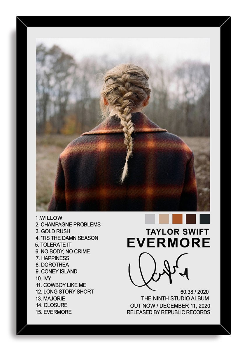 Taylor Swift Evermore framed wall art print with a black border, braided back-view portrait, woodland background, track list, and album text.