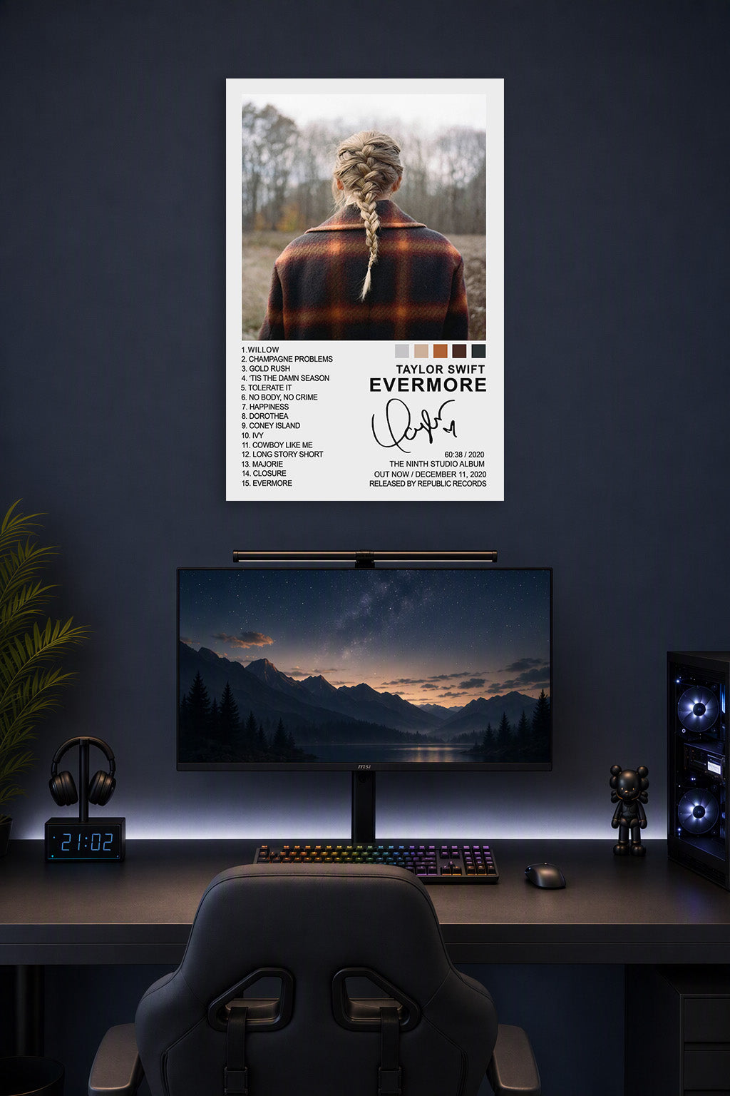 Taylor Swift Evermore Album Cover in a gaming desk setup above a monitor.