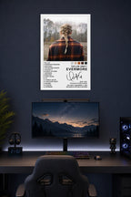 Taylor Swift Evermore Album Cover in a gaming desk setup above a monitor.