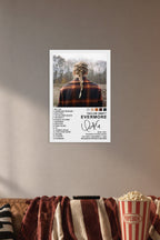 Taylor Swift Evermore Album Cover in a cozy movie room above a brown sofa with popcorn.