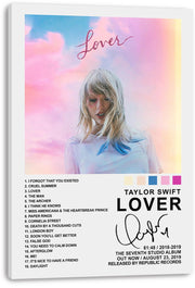 Taylor Swift Lover wall art print on a white canvas features a pastel sky portrait, track list, color swatches, and bold album text.