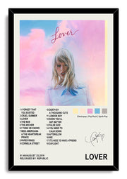 Taylor Swift Lover framed wall art print with a black border, pastel portrait, pink heart detail, track list, and signature graphic.