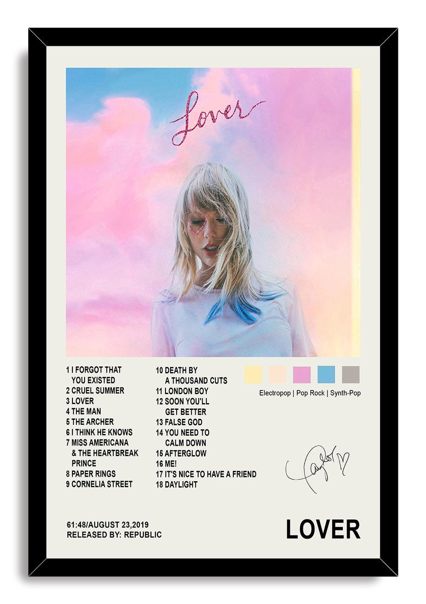 Taylor Swift Lover framed wall art print with a black border, pastel portrait, pink heart detail, track list, and signature graphic.