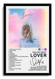 Taylor Swift Lover framed wall art print features her pastel sky portrait, glitter heart eye detail, track list, and black frame.