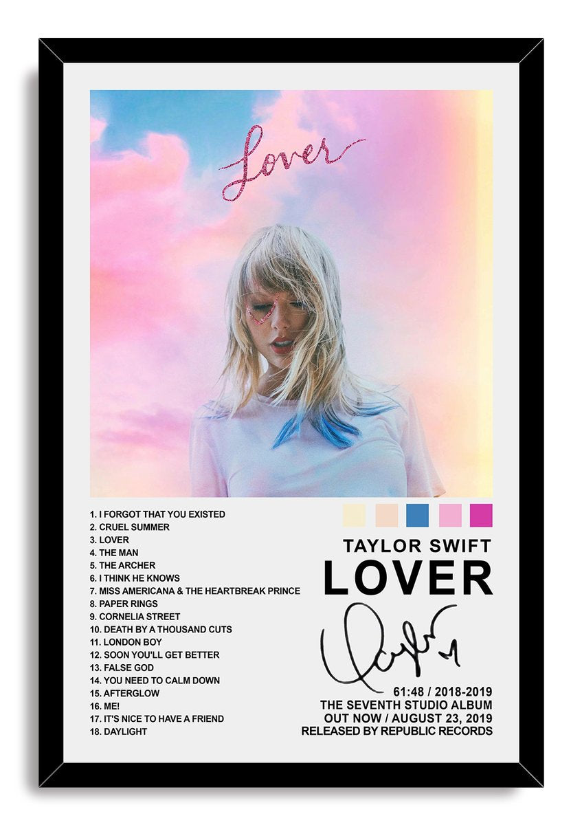 Taylor Swift Lover framed wall art print features her pastel sky portrait, glitter heart eye detail, track list, and black frame.