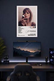 Taylor Swift "Midnights" Album Art in a gaming desk setup above a monitor.