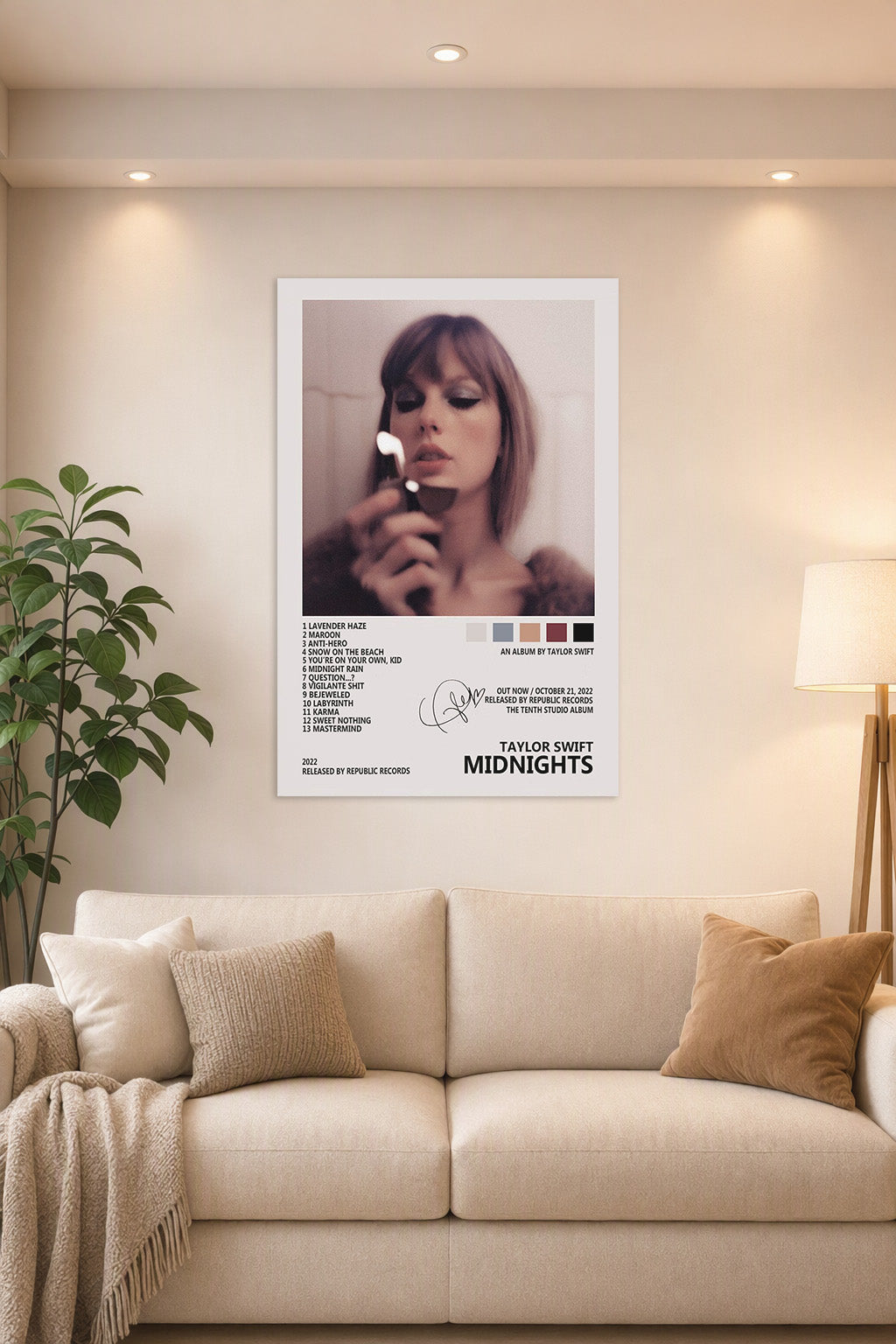 Taylor Swift "Midnights" Album Art in a bright living room above a beige sofa.