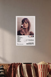 Taylor Swift "Midnights" Album Art in a cozy movie room above a brown sofa with popcorn.
