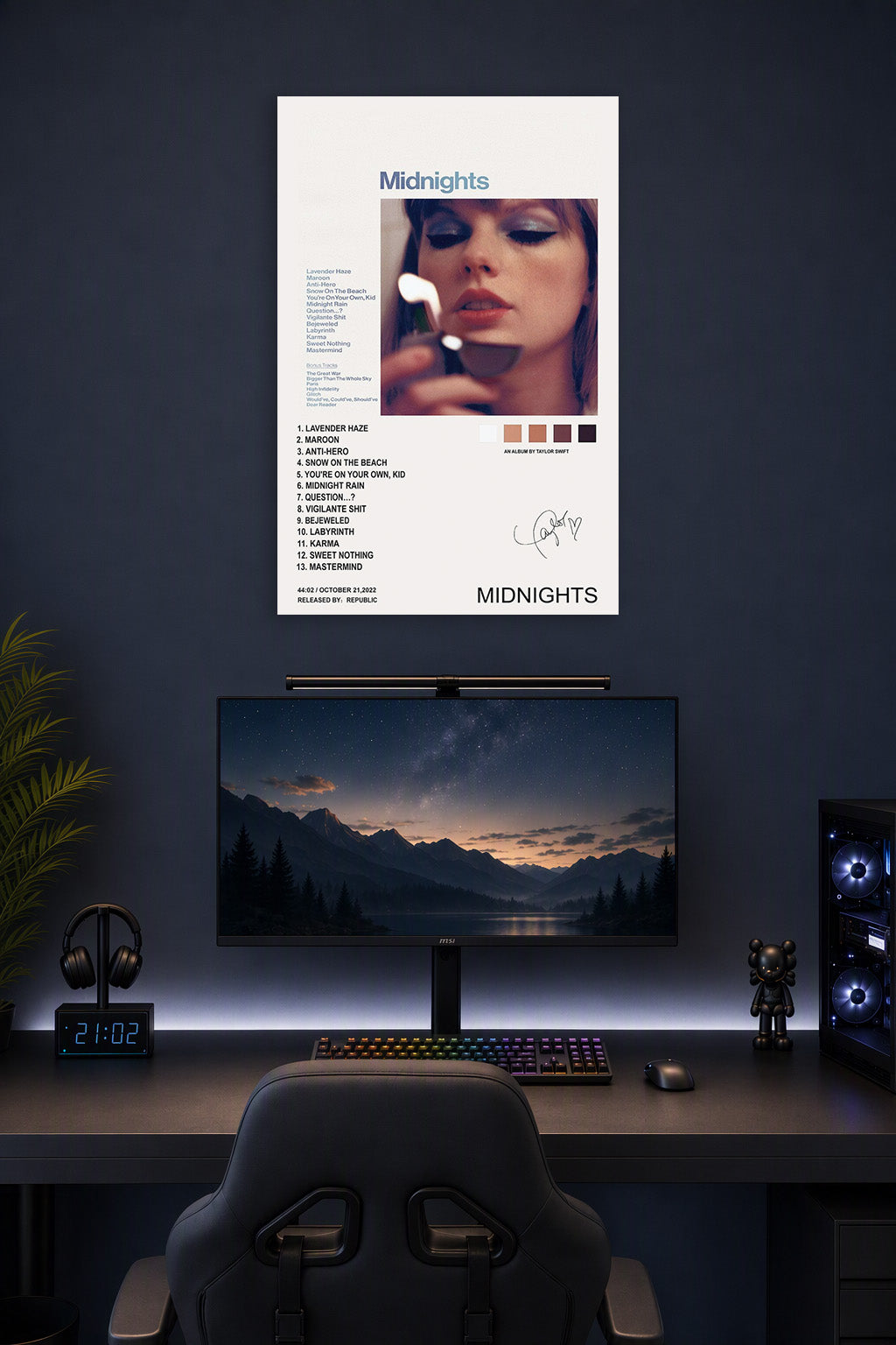 Taylor Swift Midnights Album in a gaming desk setup above a monitor.