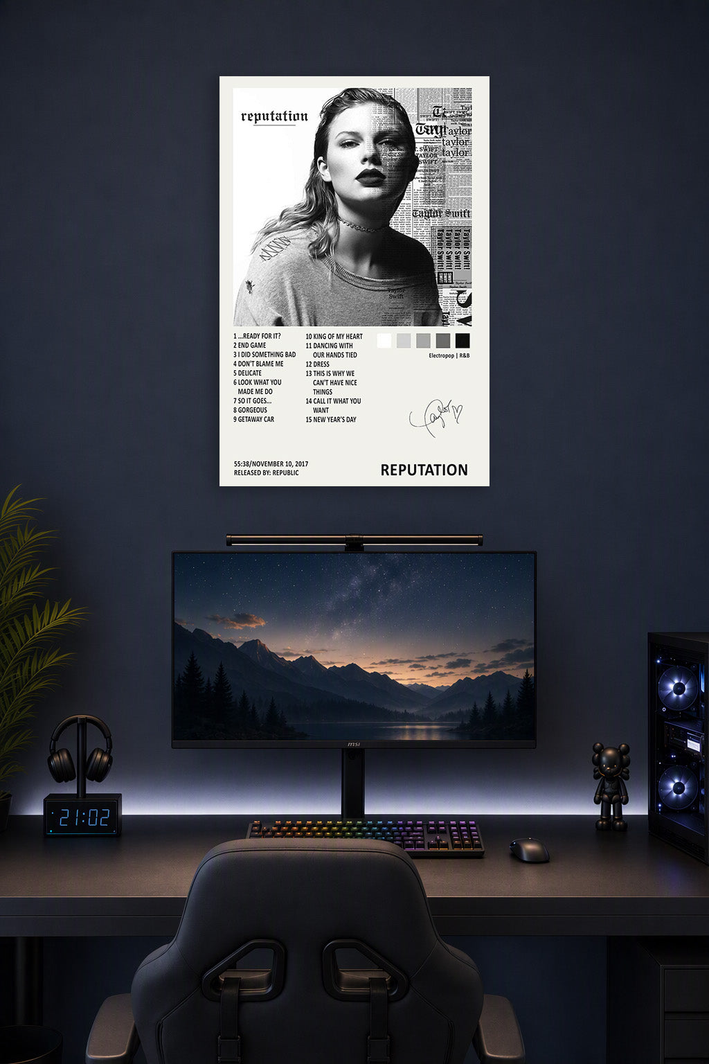 Taylor Swift Reputation Album in a gaming desk setup above a monitor.