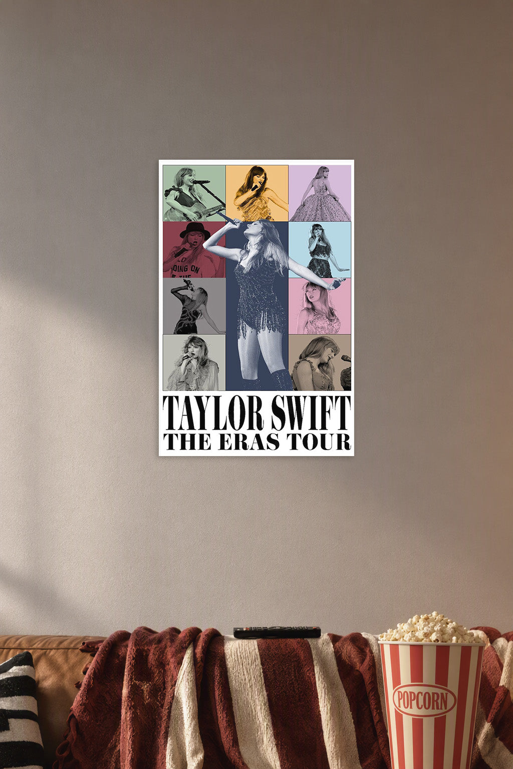 Taylor Swift The Eras Tour in a cozy movie room above a brown sofa with popcorn.