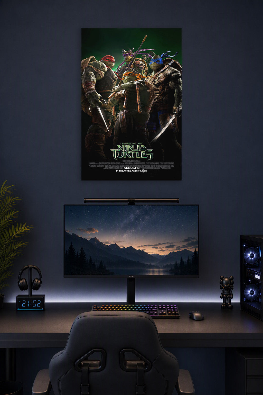 Teenage Mutant Ninja Turtles in a gaming desk setup above a monitor.