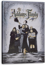 The Addams Family canvas wall art print displays the posed family, stylized title lettering, marble backdrop, and checkerboard floor.