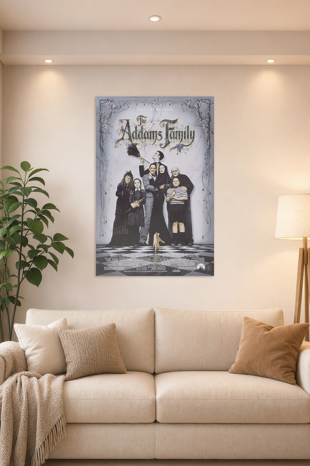 The Addams Family in a bright living room above a beige sofa.