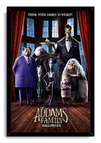 The Addams Family Halloween framed wall art print depicts the animated family gathered around a wicker chair in a moonlit hall.