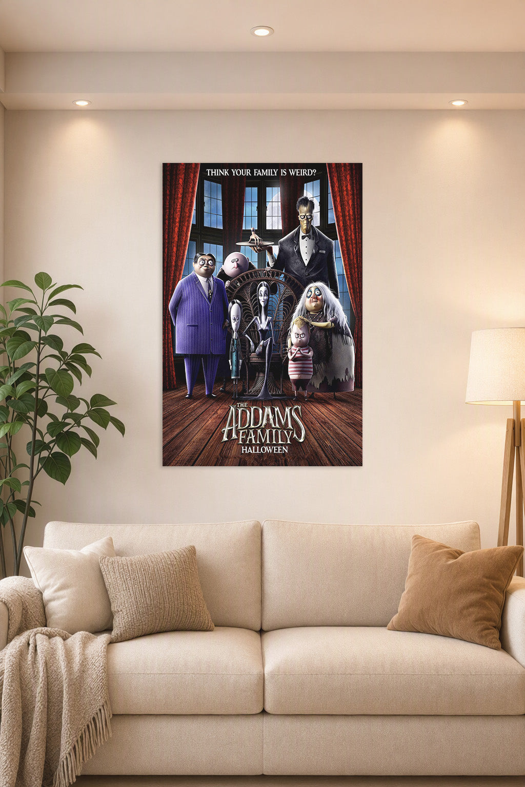 The Addams Family Halloween in a bright living room above a beige sofa.
