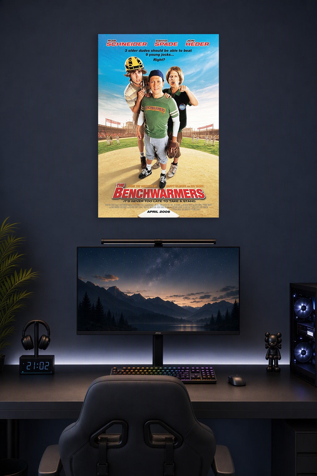 The Benchwarmers Rob Schneider David Spade Jon Heder in a gaming desk setup above a monitor.