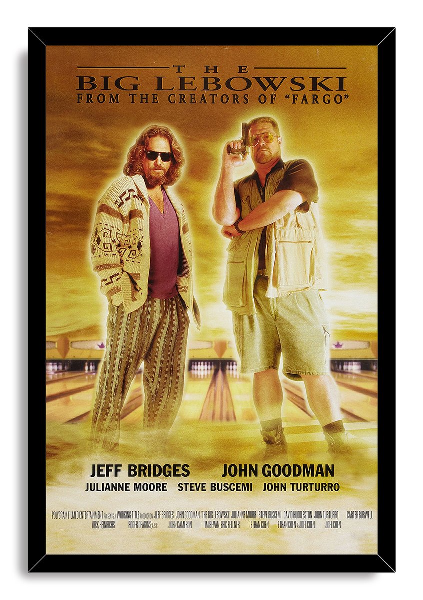 The Big Lebowski framed wall art print with a black border, depicting The Dude and Walter on illuminated bowling lanes in gold tones.