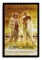 The Big Lebowski framed wall art print with a black border, depicting The Dude and Walter on illuminated bowling lanes in gold tones.