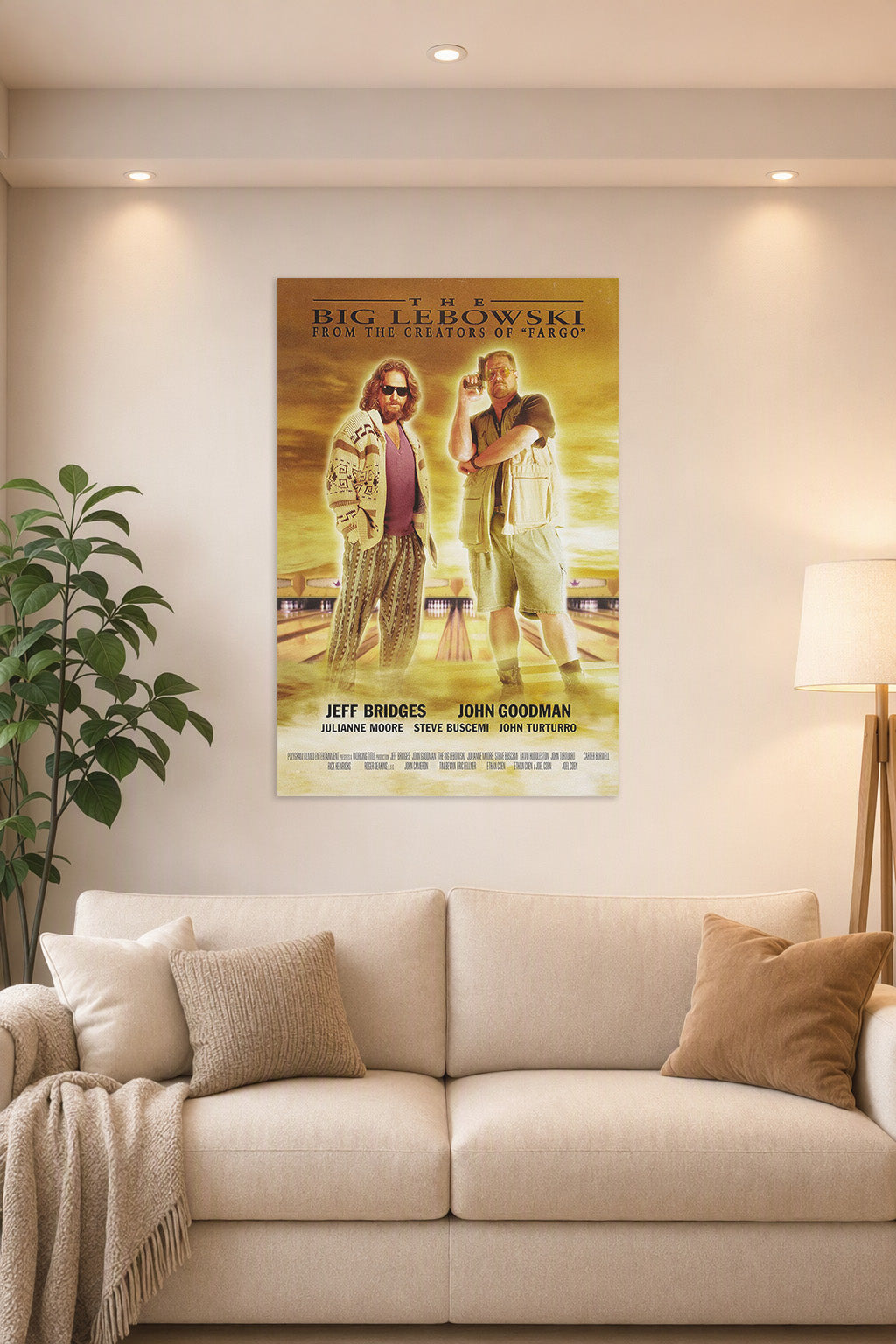 The Big Lebowski Movie Poster in a bright living room above a beige sofa.