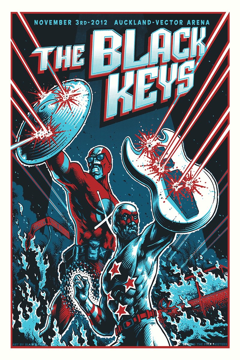The Black Keys poster depicts two comic-book superheroes with a shield and guitar amid red laser blasts and blue waves.