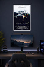 The Blues Brothers in a gaming desk setup above a monitor.