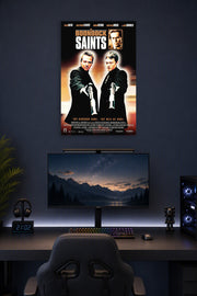 The Boondock Saints in a gaming desk setup above a monitor.
