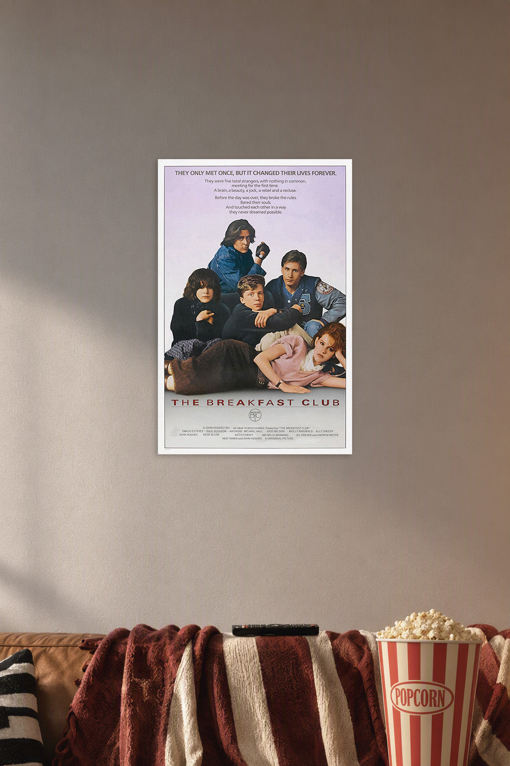 The Breakfast Club Movies in a cozy movie room above a brown sofa with popcorn.