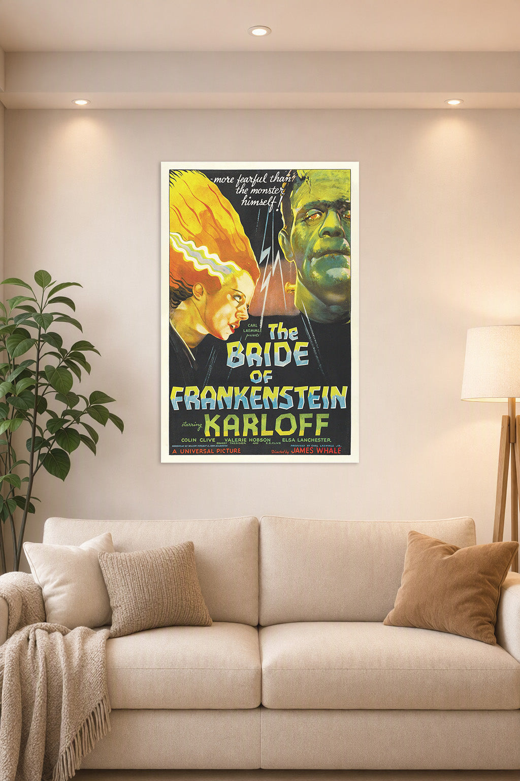 The Bride of Frankenstein Movie Poster in a bright living room above a beige sofa.