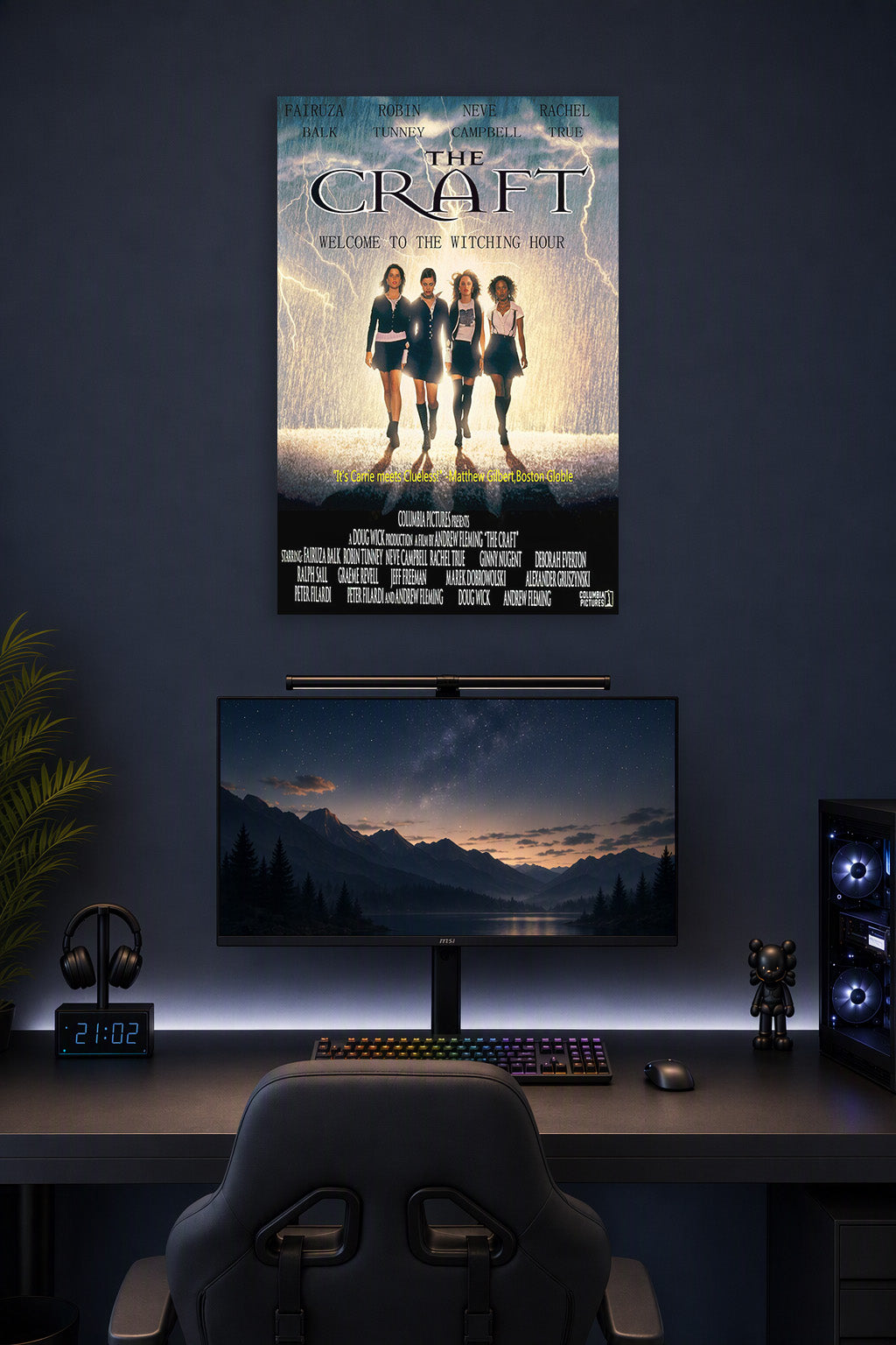 The Craft Movie Witches in a gaming desk setup above a monitor.