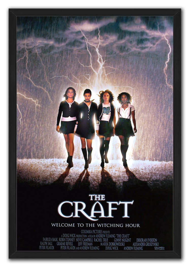 The Craft framed poster presents four women walking under a lightning-filled rainy sky, with bold white film title lettering at the bottom.