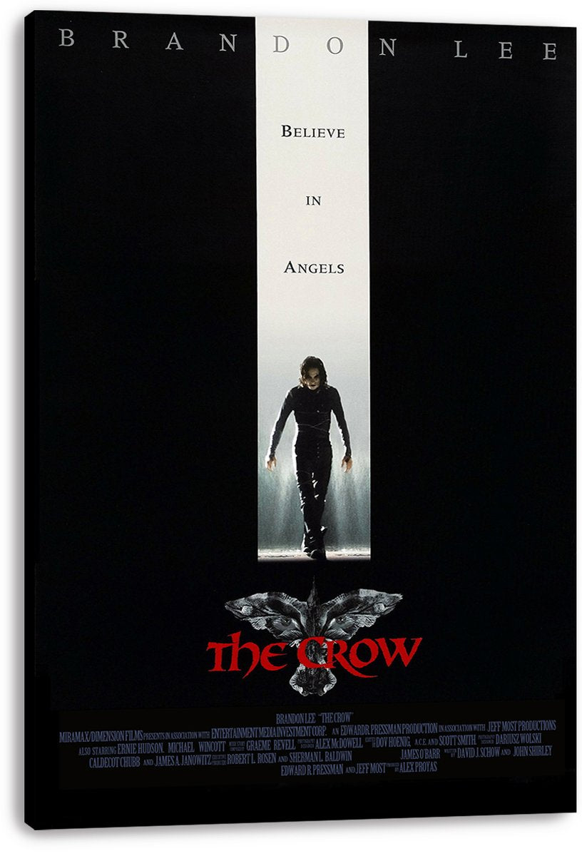 The Crow canvas wall art print displays Brandon Lee in a lighted white column, a crow emblem, and vivid red title lettering.