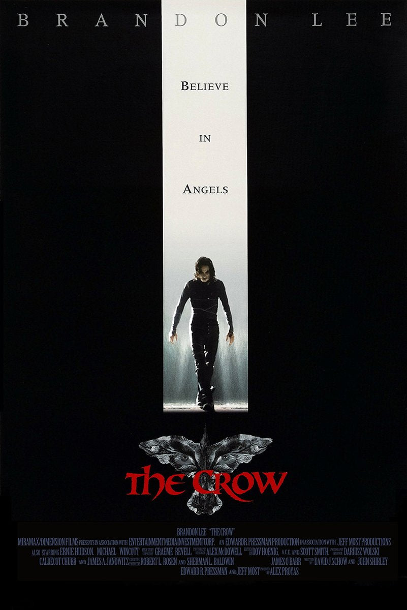 The Crow poster features Brandon Lee walking through a white beam of light above a crow, with red title text on black.
