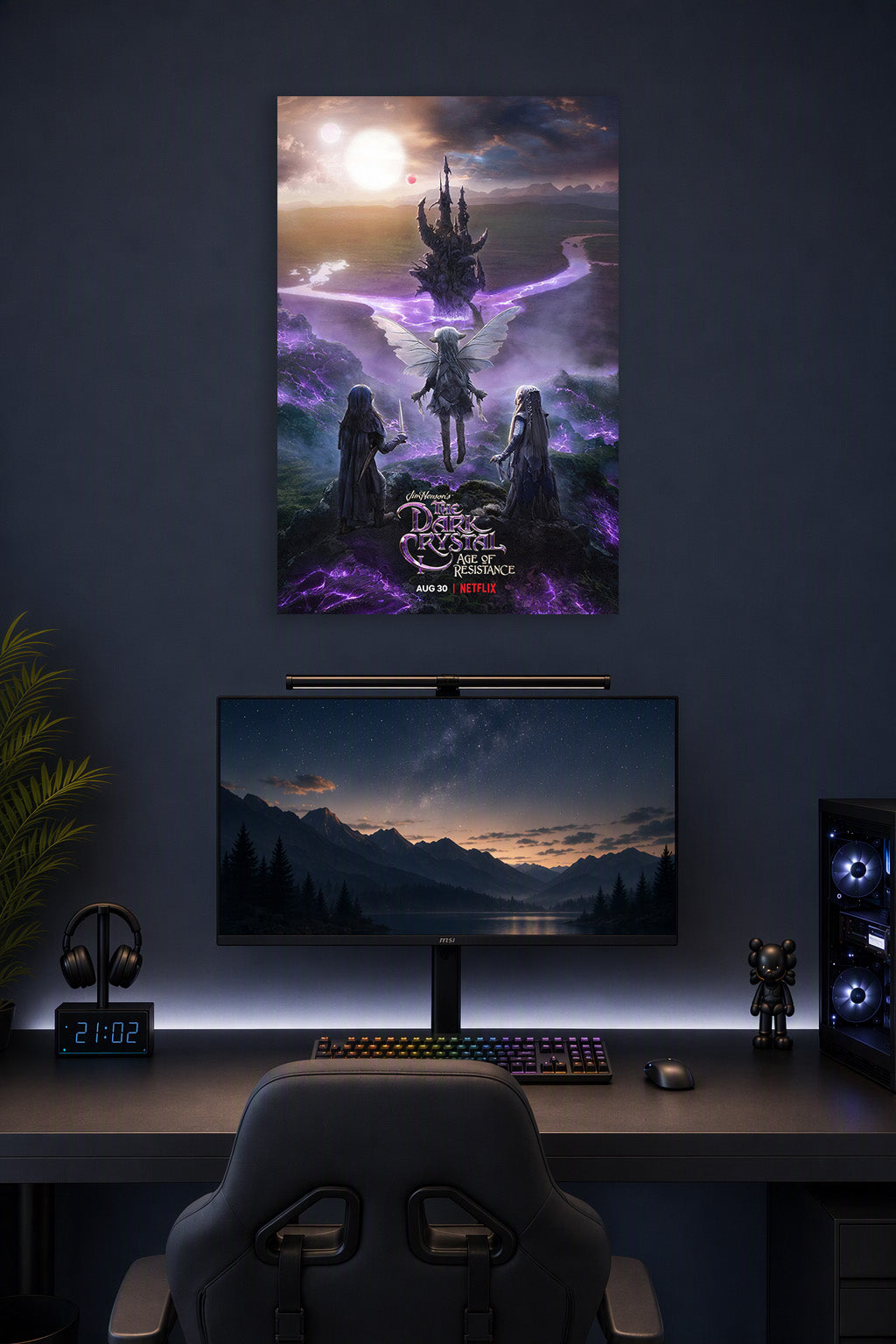 The Dark Crystal Age of Resistance Gelfling Heroes in a gaming desk setup above a monitor.