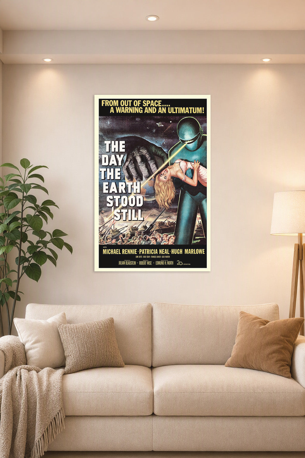 The Day the Earth Stood Still Movie Poster in a bright living room above a beige sofa.