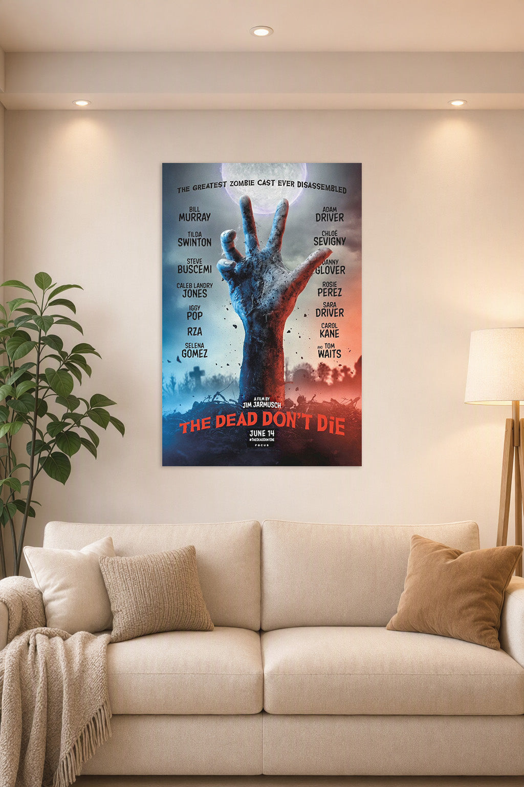 The Dead Don't Die Movie Poster in a bright living room above a beige sofa.