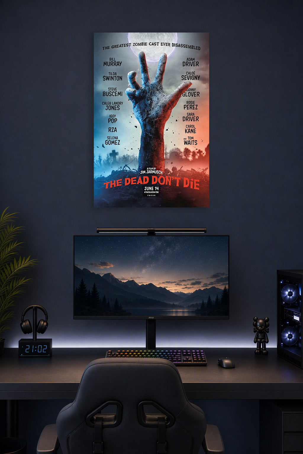The Dead Don't Die Movie Poster in a gaming desk setup above a monitor.