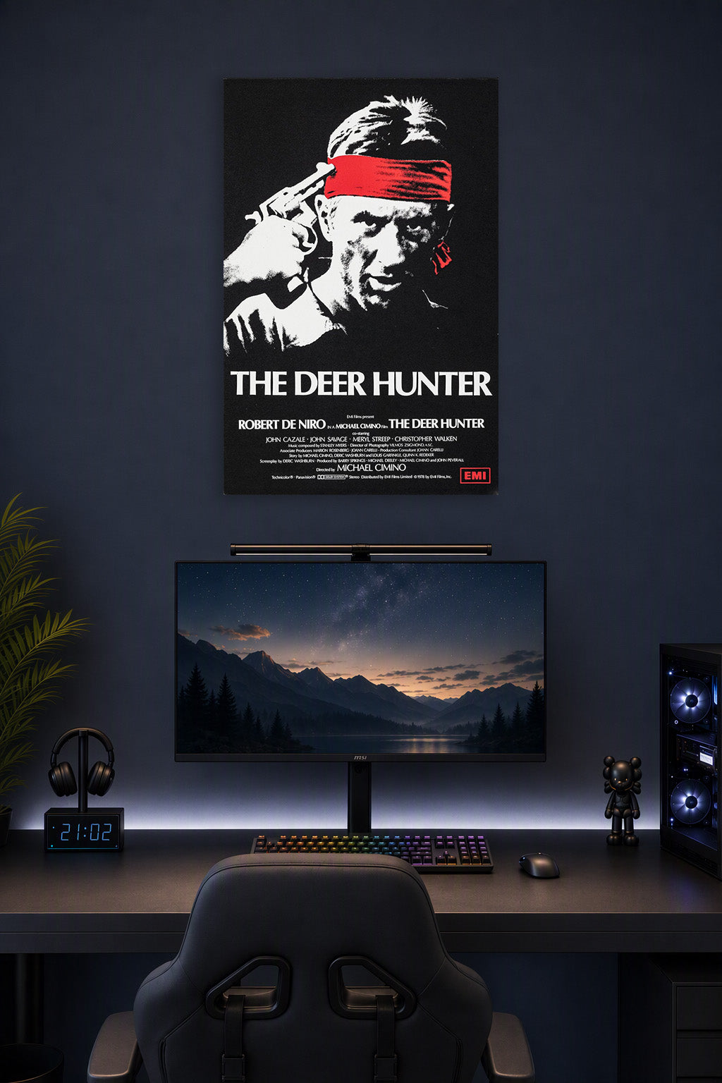The Deer Hunter Movie Robert De Niro in a gaming desk setup above a monitor.