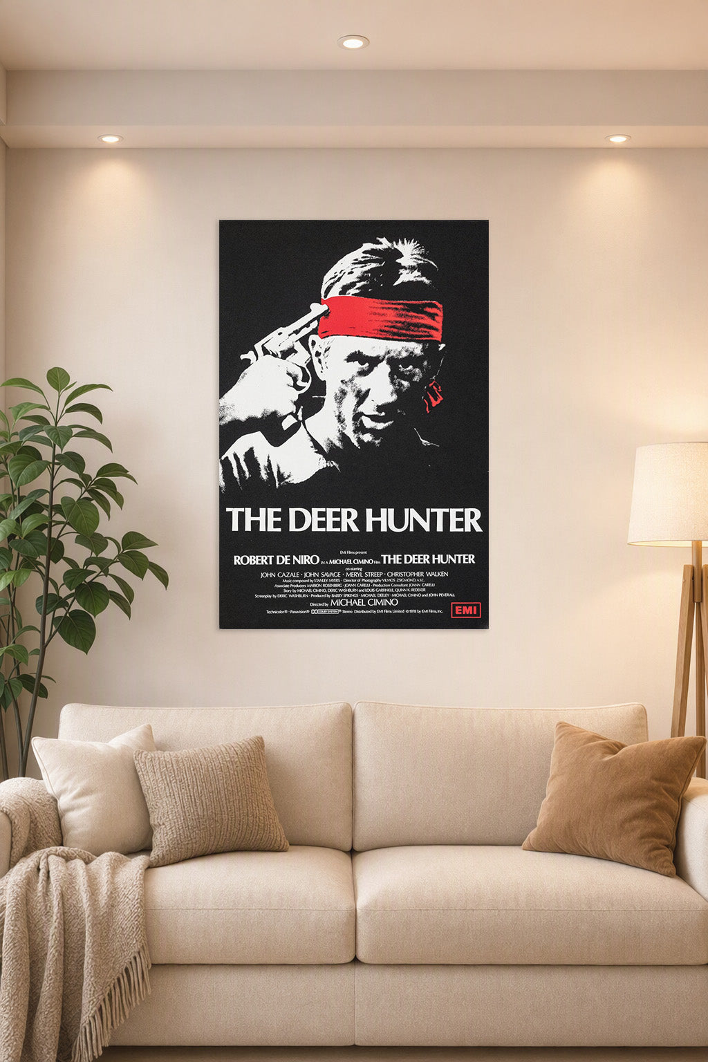 The Deer Hunter Movie Robert De Niro in a bright living room above a beige sofa.